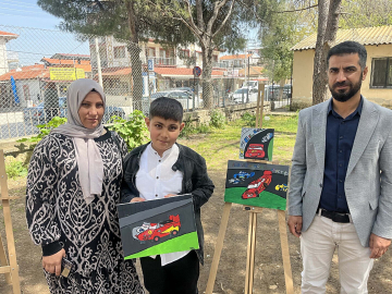 10 yaşındaki otizmli Hasan, ilk resim sergisini açtı / Ek fotoğraflar