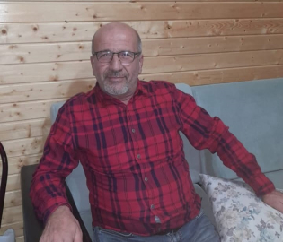 Kamyonuna branda çekerken düşüp öldü