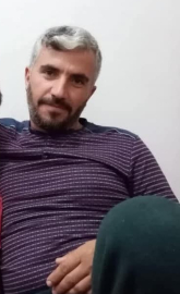 Lastiğini değiştirdiği TIR'ın altında kalan şoför, yaşam mücadelesini kaybetti